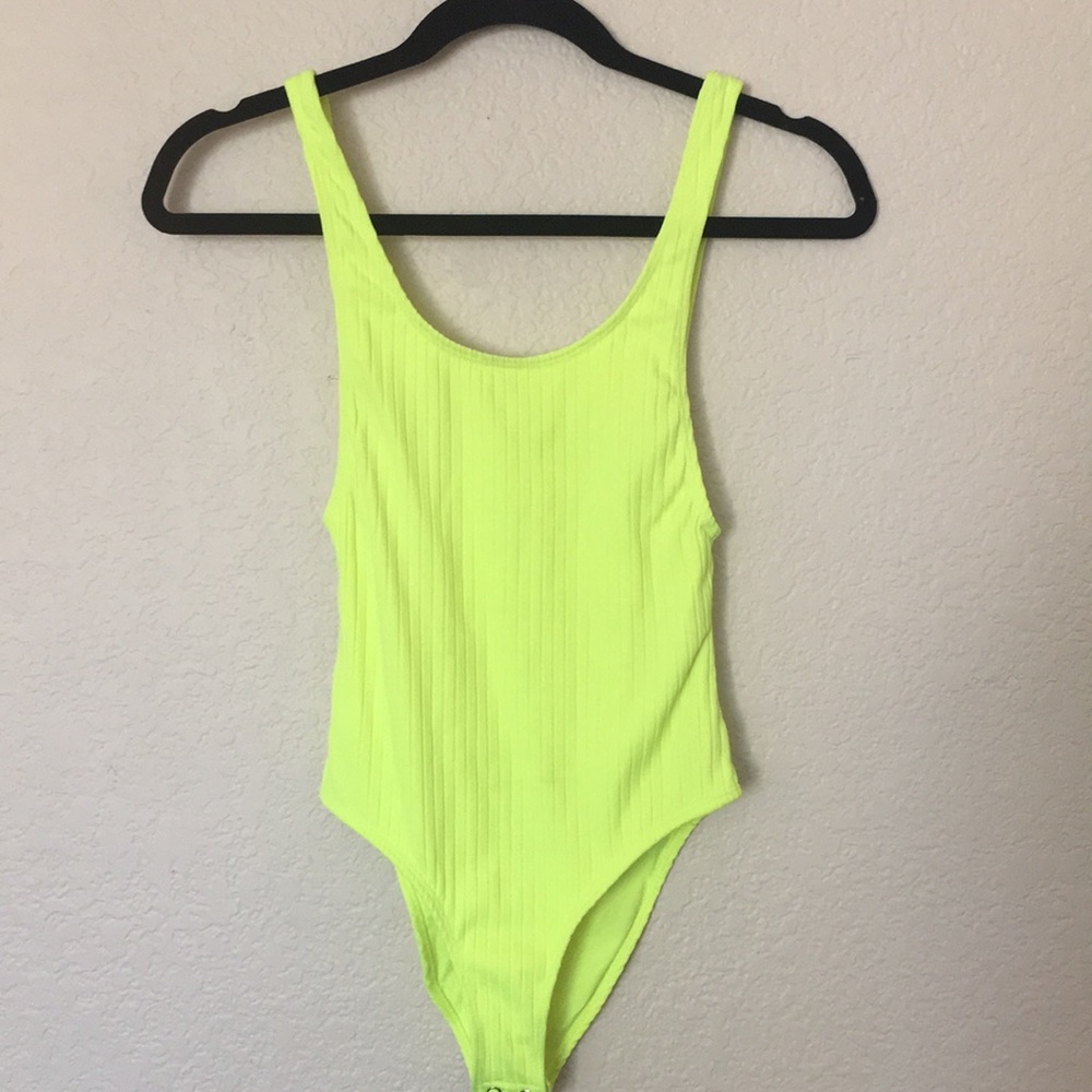 Neon yellow body suit